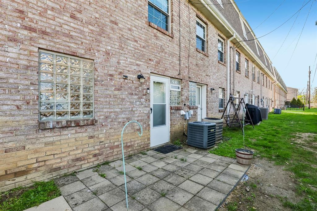 239 Whitestown Village, Unit F Butler, PA 16001 - Photo 35 of 40 a view of a brick house with a yard