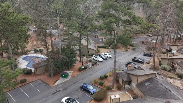 an aerial view of a house with outdoor space