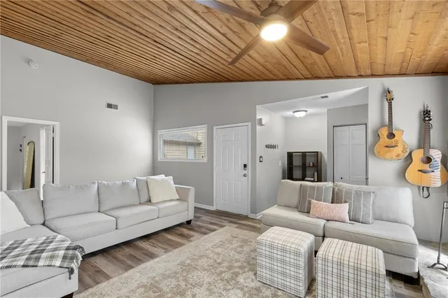 a living room with furniture and a couch