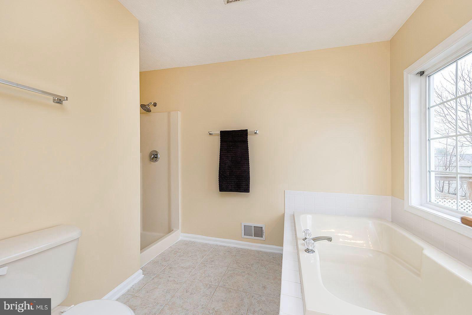 29 Roger Court Ranson, WV 25438 - Photo 19 of 41 Bathroom has tub, and shower