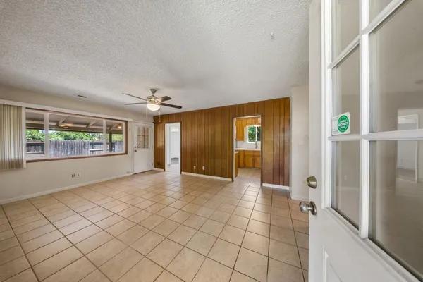 a view of an empty room and window