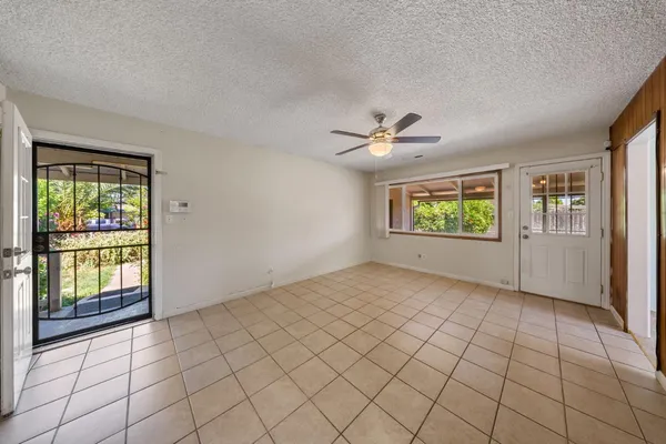 a view of an empty room and window