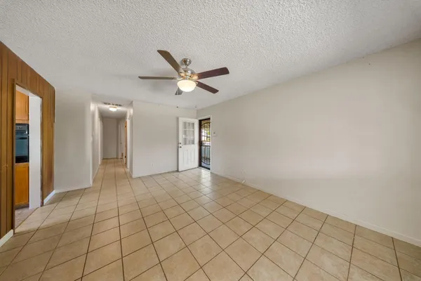 a view of an empty room and window