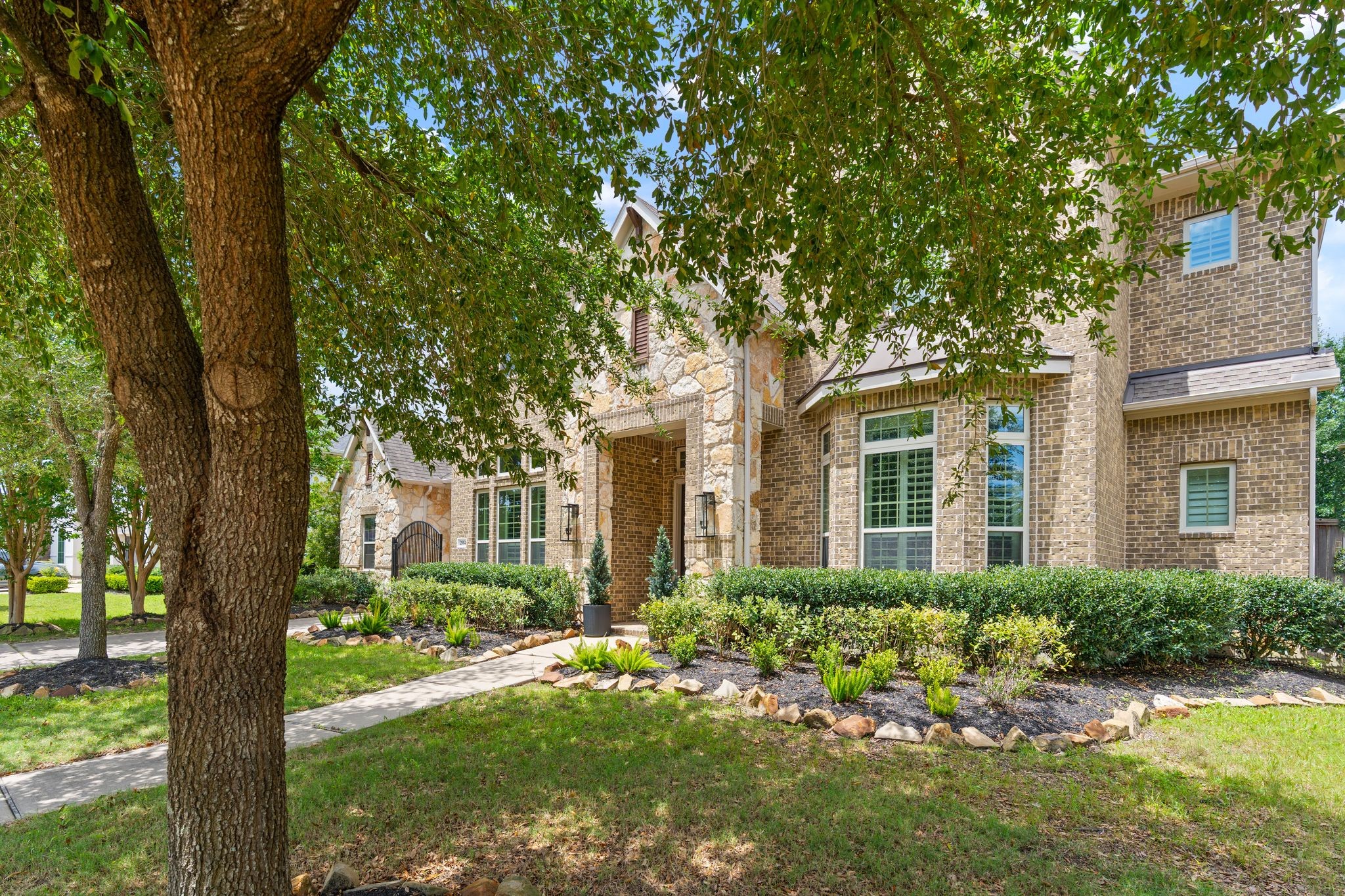 2914 Rutherford Pl Court Katy, TX 77494 - Photo 4 of 50 a front view of a house with a yard