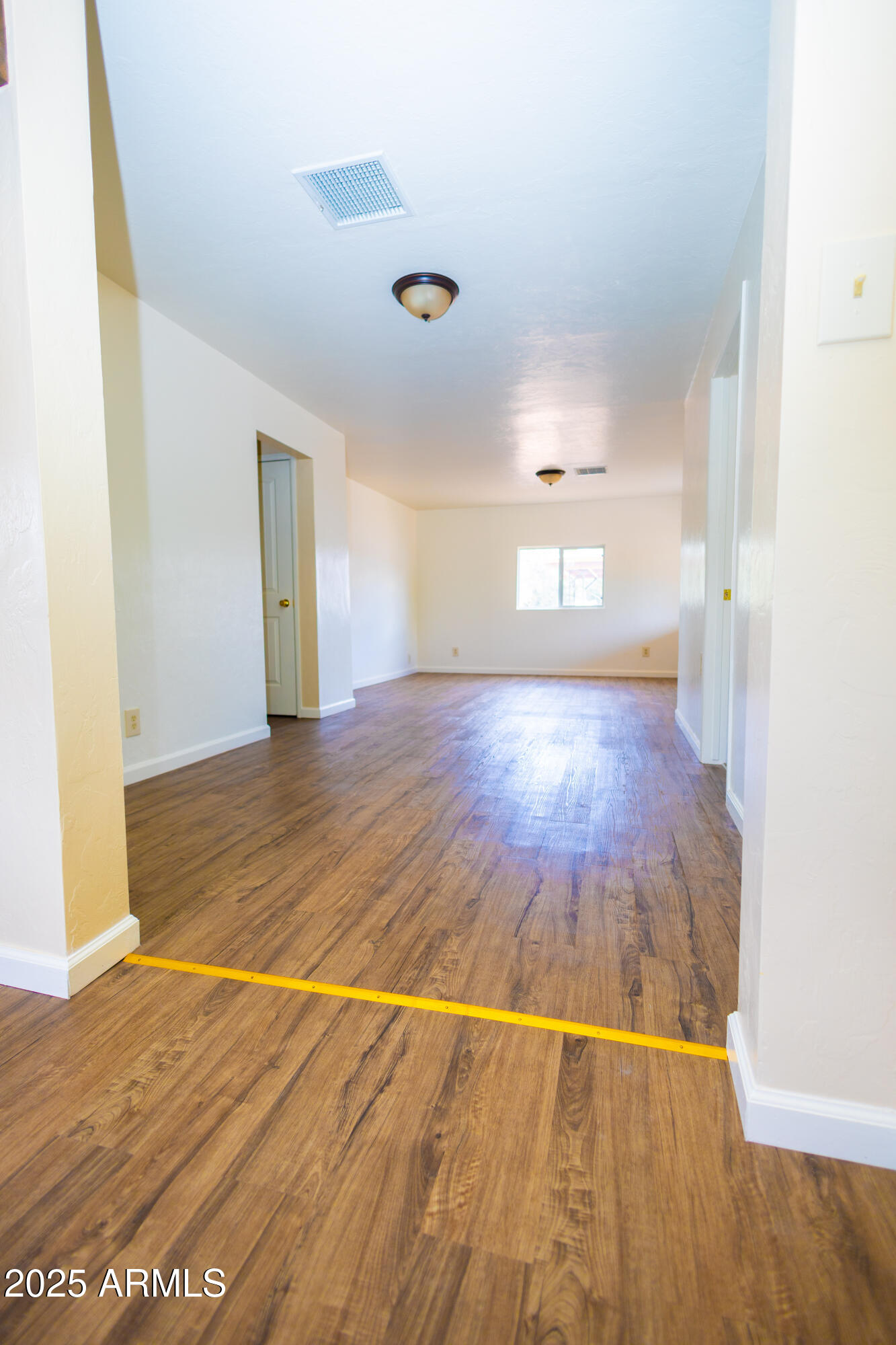 660 B Avenue Douglas, AZ 85607 - Photo 9 of 32 a view of empty room with wooden floor