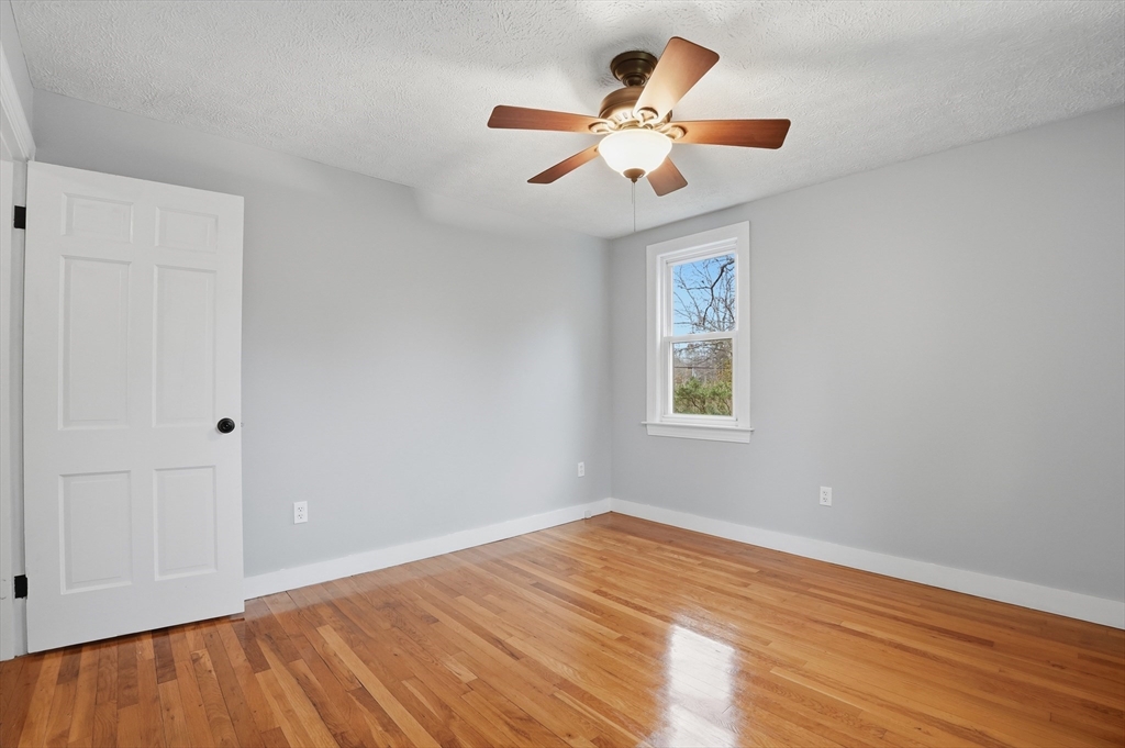 590 Sandwich Road Falmouth, MA 02536 - Photo 29 of 42 a view of empty room with wooden floor