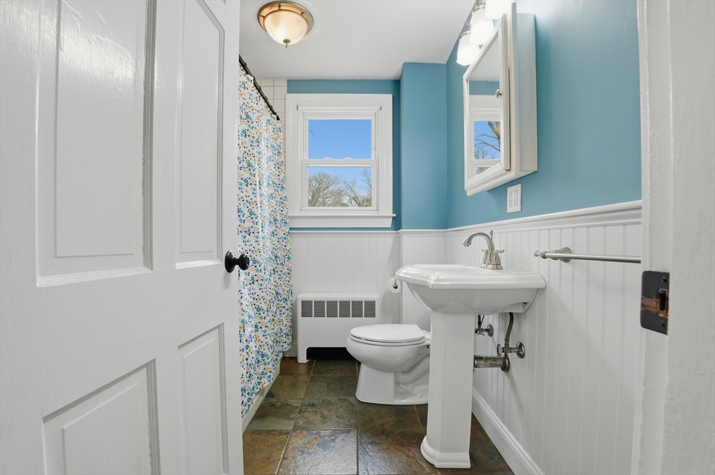 590 Sandwich Road Falmouth, MA 02536 - Photo 30 of 42 a bathroom with a sink toilet and shower