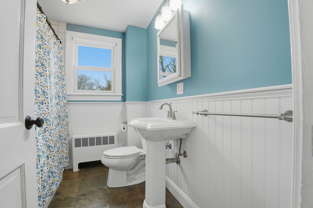 590 Sandwich Road Falmouth, MA 02536 - Photo 31 of 42 a bathroom with a sink toilet and shower