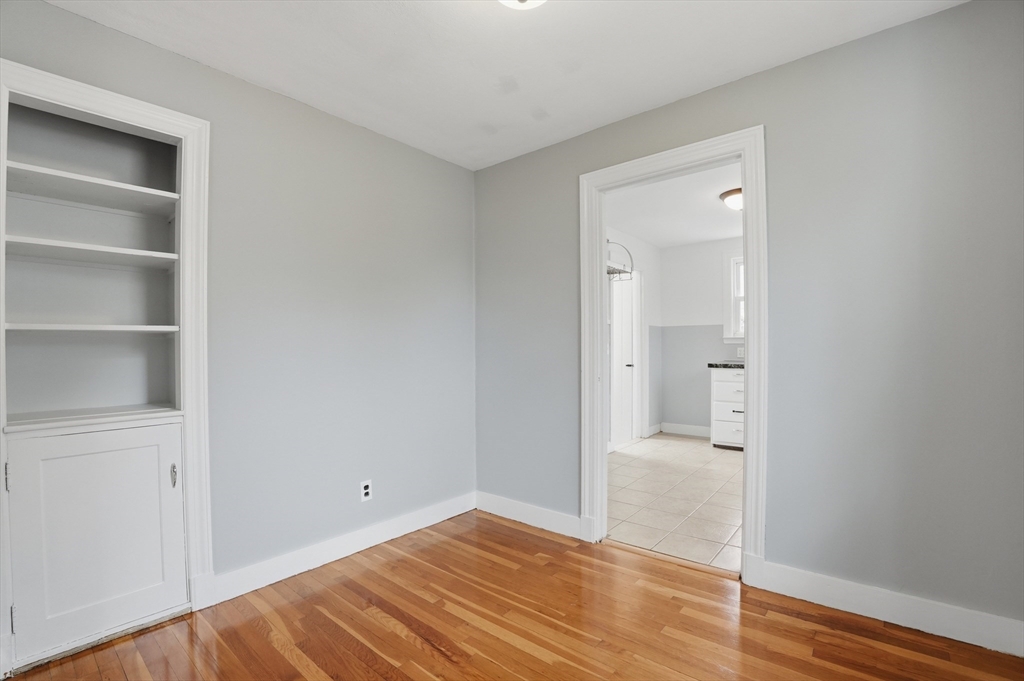 590 Sandwich Road Falmouth, MA 02536 - Photo 9 of 42 a view of a room with wooden floor and closet