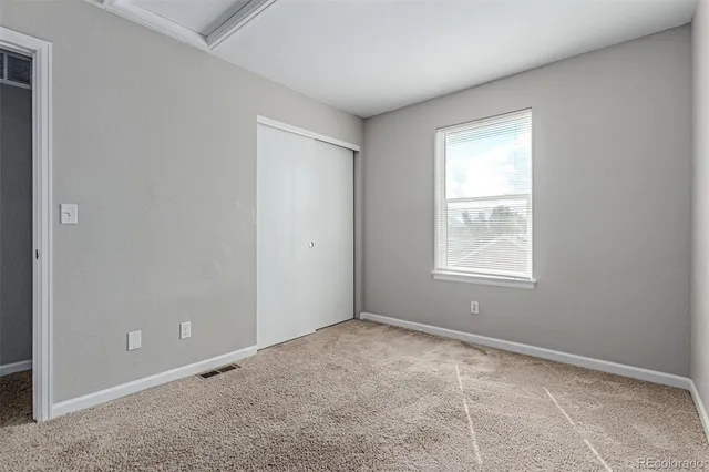 a bathroom with a sink double vanity and a mirror