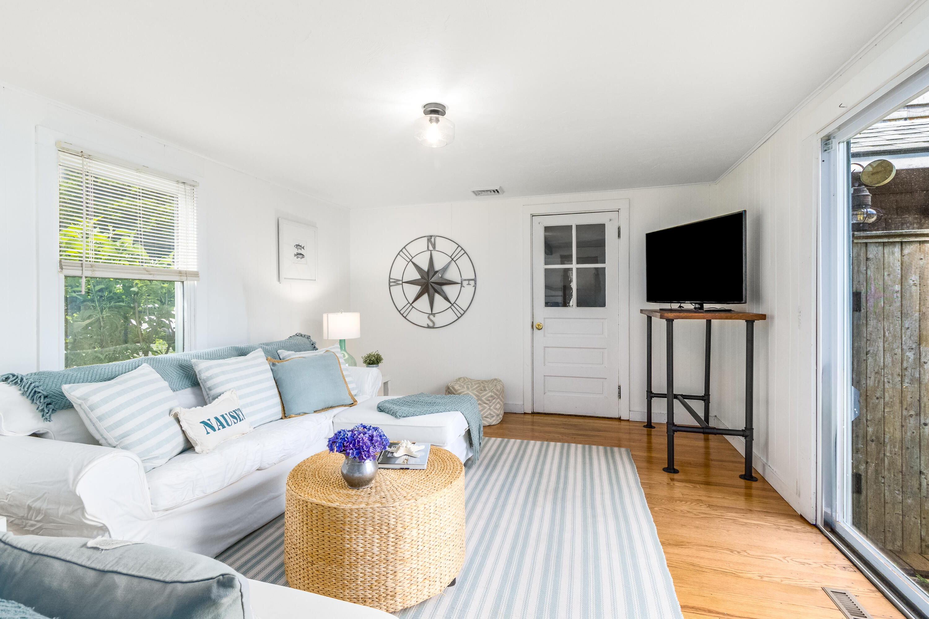 429 Paine's Creek Road Brewster, MA 02631 - Photo 11 of 35 a living room with furniture and a flat screen tv