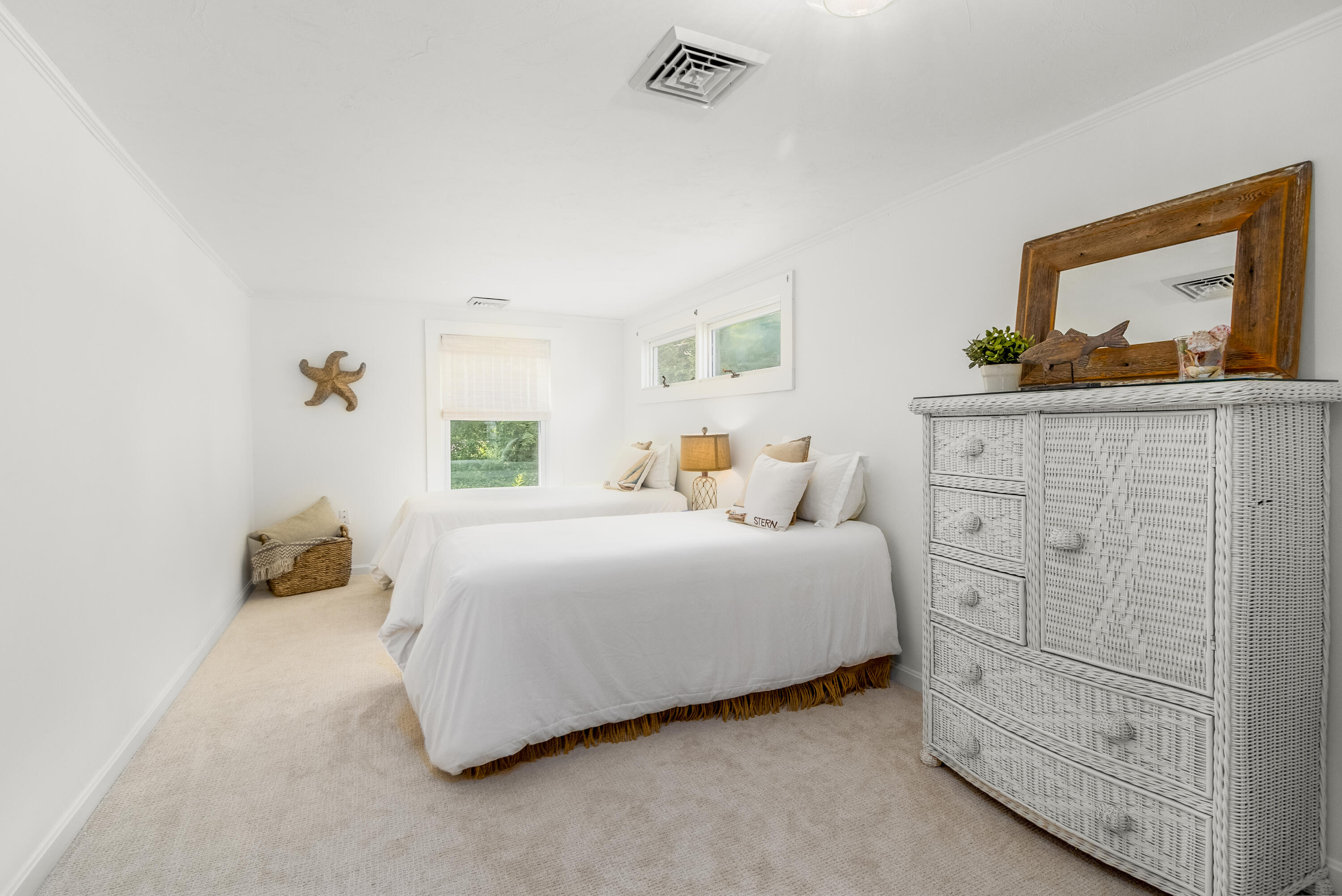 429 Paine's Creek Road Brewster, MA 02631 - Photo 15 of 35 a bedroom with a bed and dresser