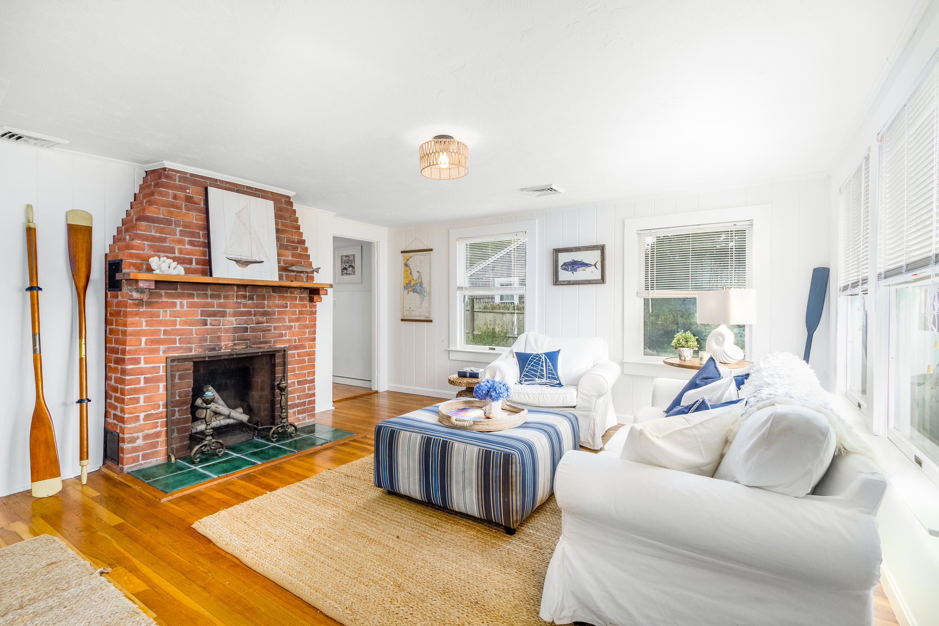 429 Paine's Creek Road Brewster, MA 02631 - Photo 2 of 35 a living room with furniture and a fireplace