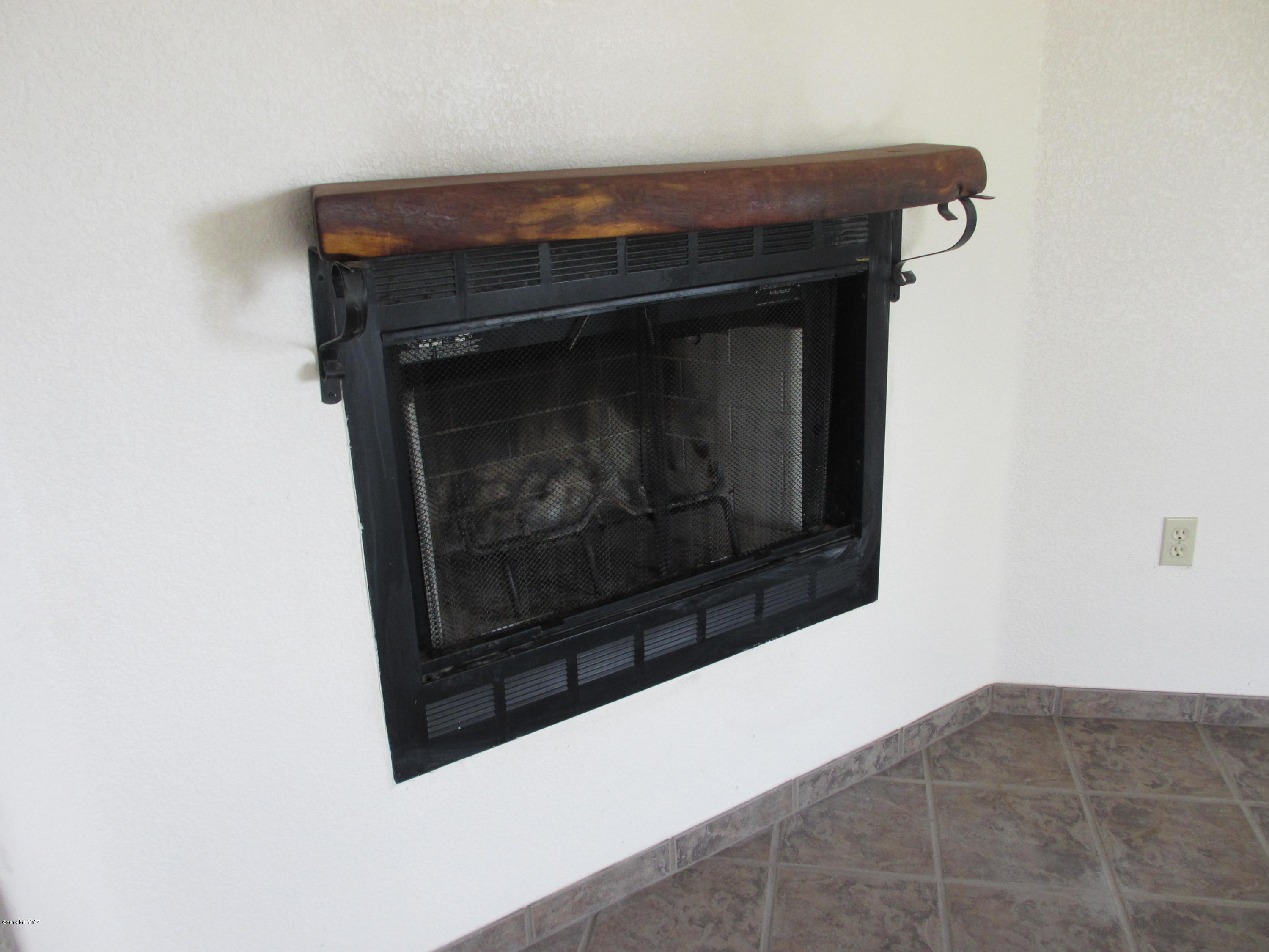 1084 Paseo Guebabi Rio Rico, AZ 85648 - Photo 18 of 33 a close view of fireplace