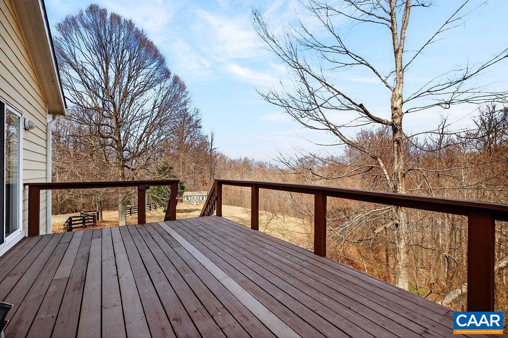 62 Summit Court Roseland, VA 22967 - Photo 17 of 75 a view of balcony with wooden floor and fence