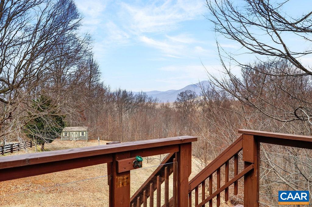 62 Summit Court Roseland, VA 22967 - Photo 18 of 75 a view of a balcony with wooden fence and floor