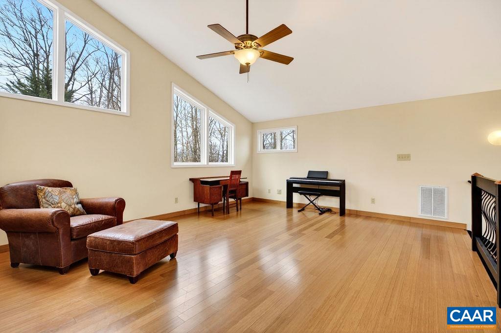 62 Summit Court Roseland, VA 22967 - Photo 39 of 75 a living room with furniture and a wooden floor