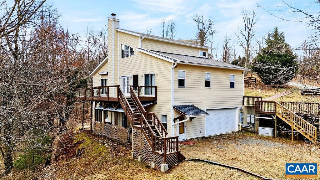 62 Summit Court Roseland, VA 22967 - Photo 60 of 75 a view of a house with backyard and deck