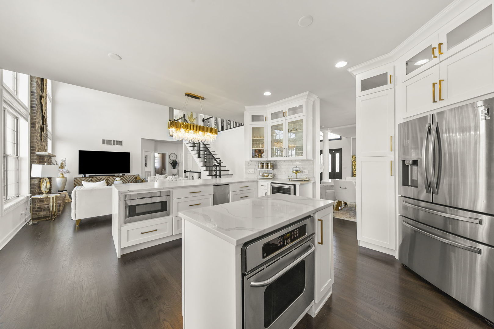 16441 Mueller Circle Plainfield, IL 60586 - Photo 12 of 50 a kitchen with white cabinets and stainless steel appliances