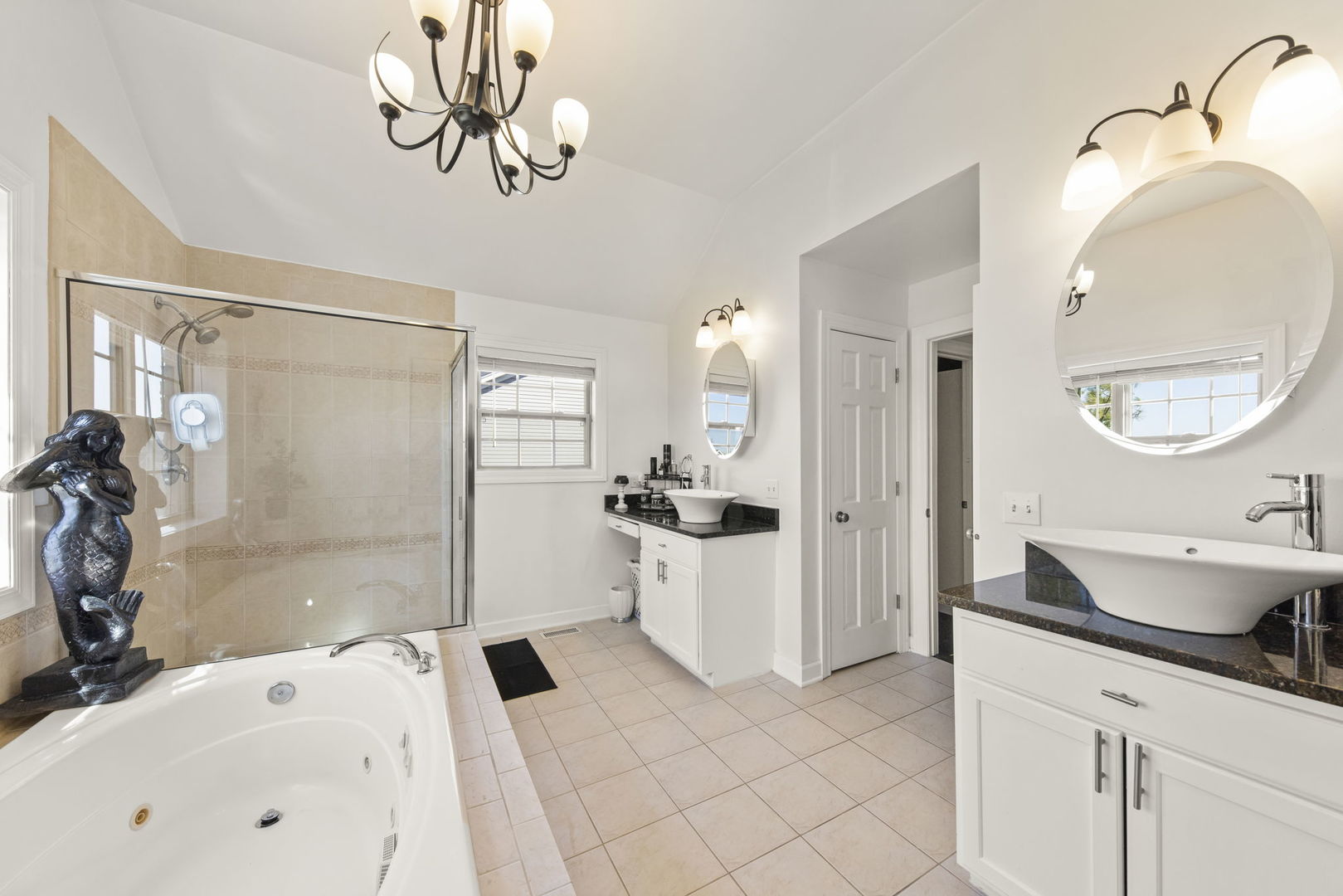 16441 Mueller Circle Plainfield, IL 60586 - Photo 25 of 50 a bathroom with a sink a toilet a mirror and shower