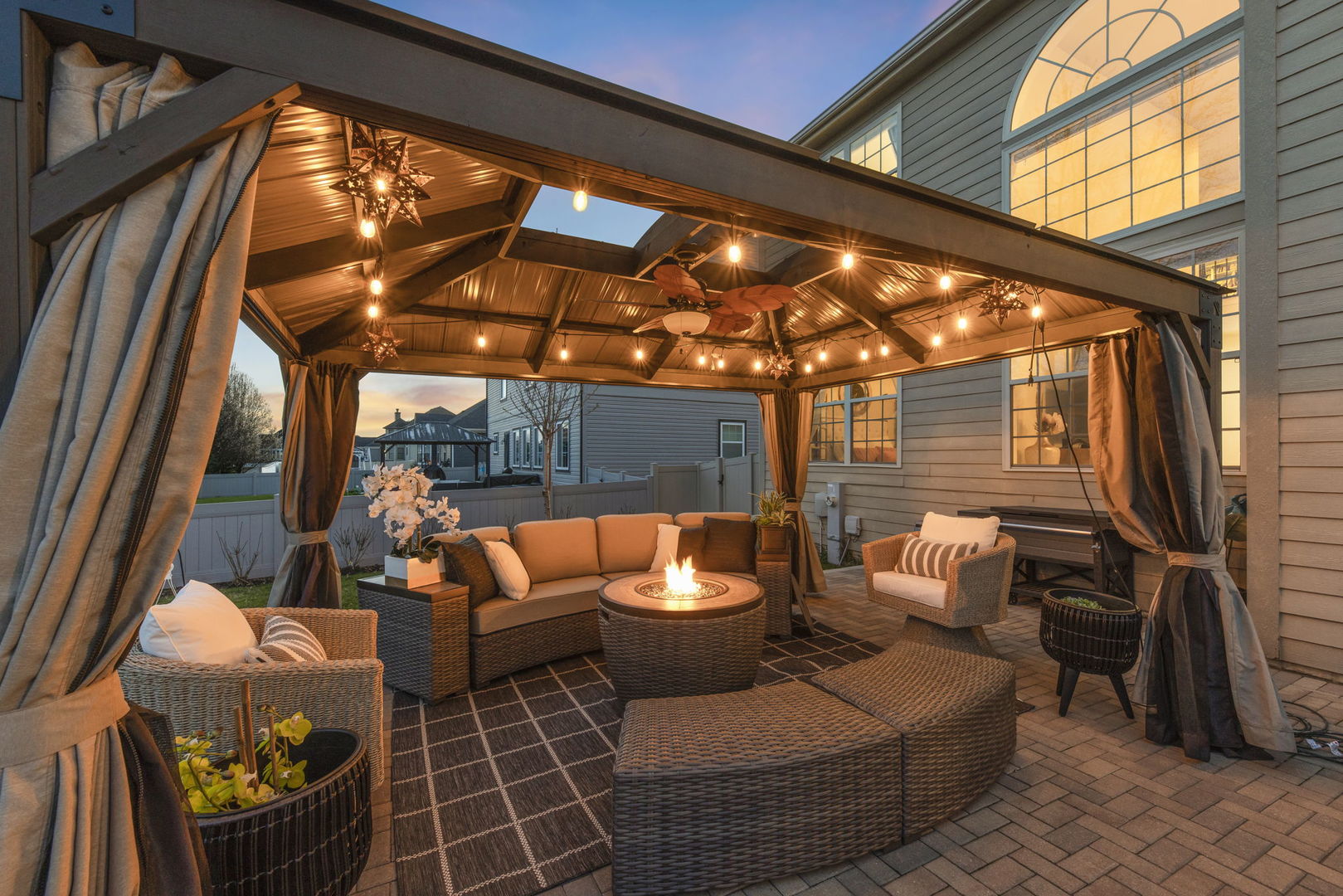16441 Mueller Circle Plainfield, IL 60586 - Photo 36 of 50 a outdoor living space with patio furniture and a potted plant