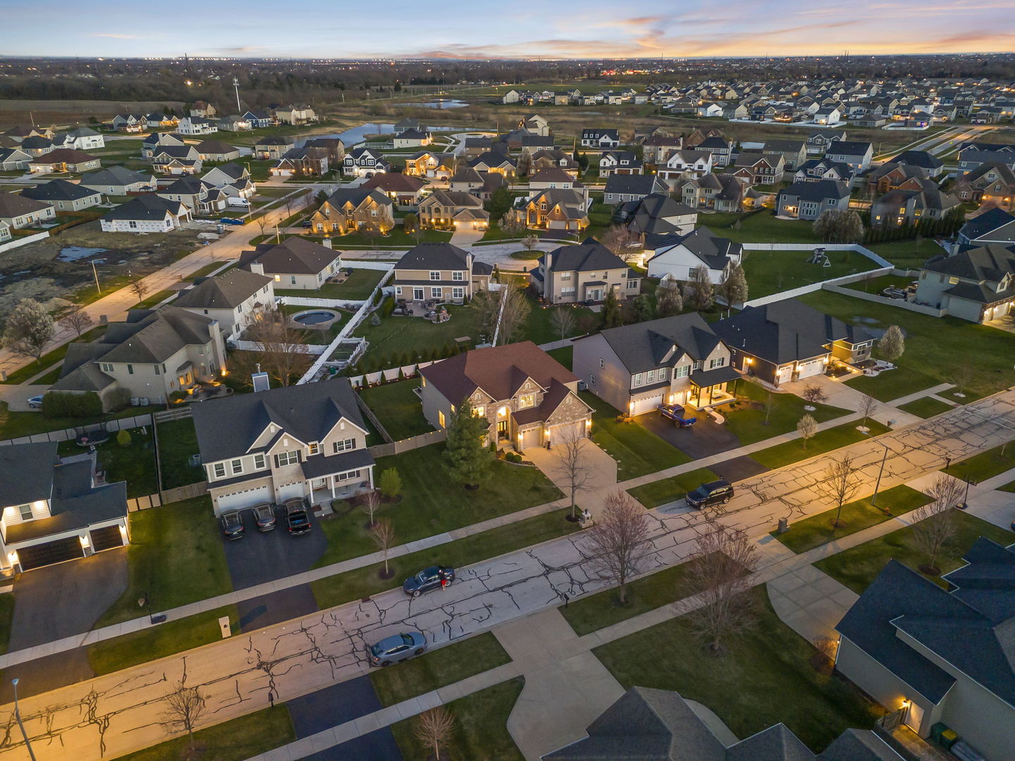 16441 Mueller Circle Plainfield, IL 60586 - Photo 47 of 50 an aerial view of a house with a lake view
