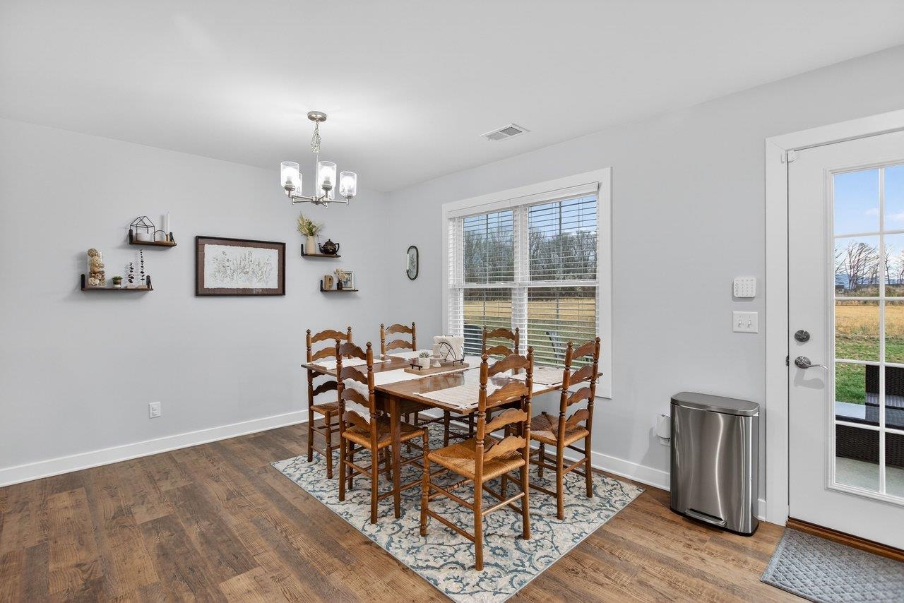 106 16th Street Grottoes, VA 24441 - Photo 12 of 71 a view of a dining room with furniture and chandelier