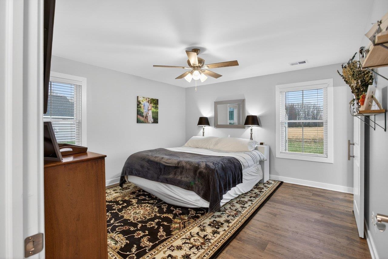 106 16th Street Grottoes, VA 24441 - Photo 19 of 71 a bedroom with a bed dresser and a window