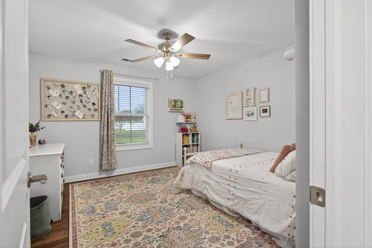 106 16th Street Grottoes, VA 24441 - Photo 26 of 71 a bedroom with a bed and a dresser