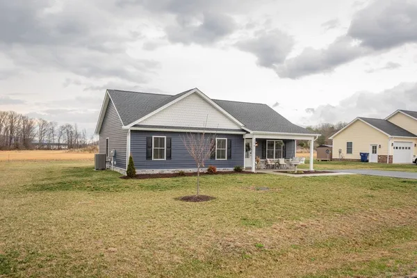 front view of a house with a yard