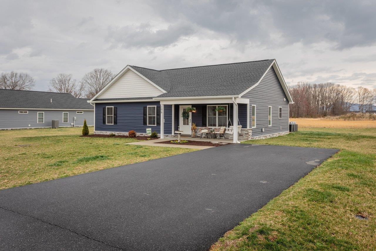 106 16th Street Grottoes, VA 24441 - Photo 41 of 71 a house with swimming pool in front of it