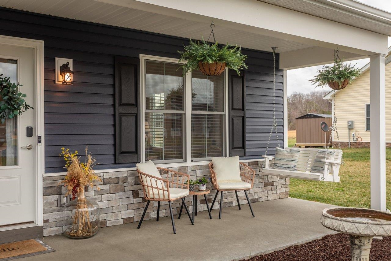 106 16th Street Grottoes, VA 24441 - Photo 44 of 71 a view of a patio with table and chairs and potted plants