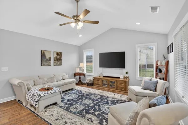 a living room with furniture and a couch