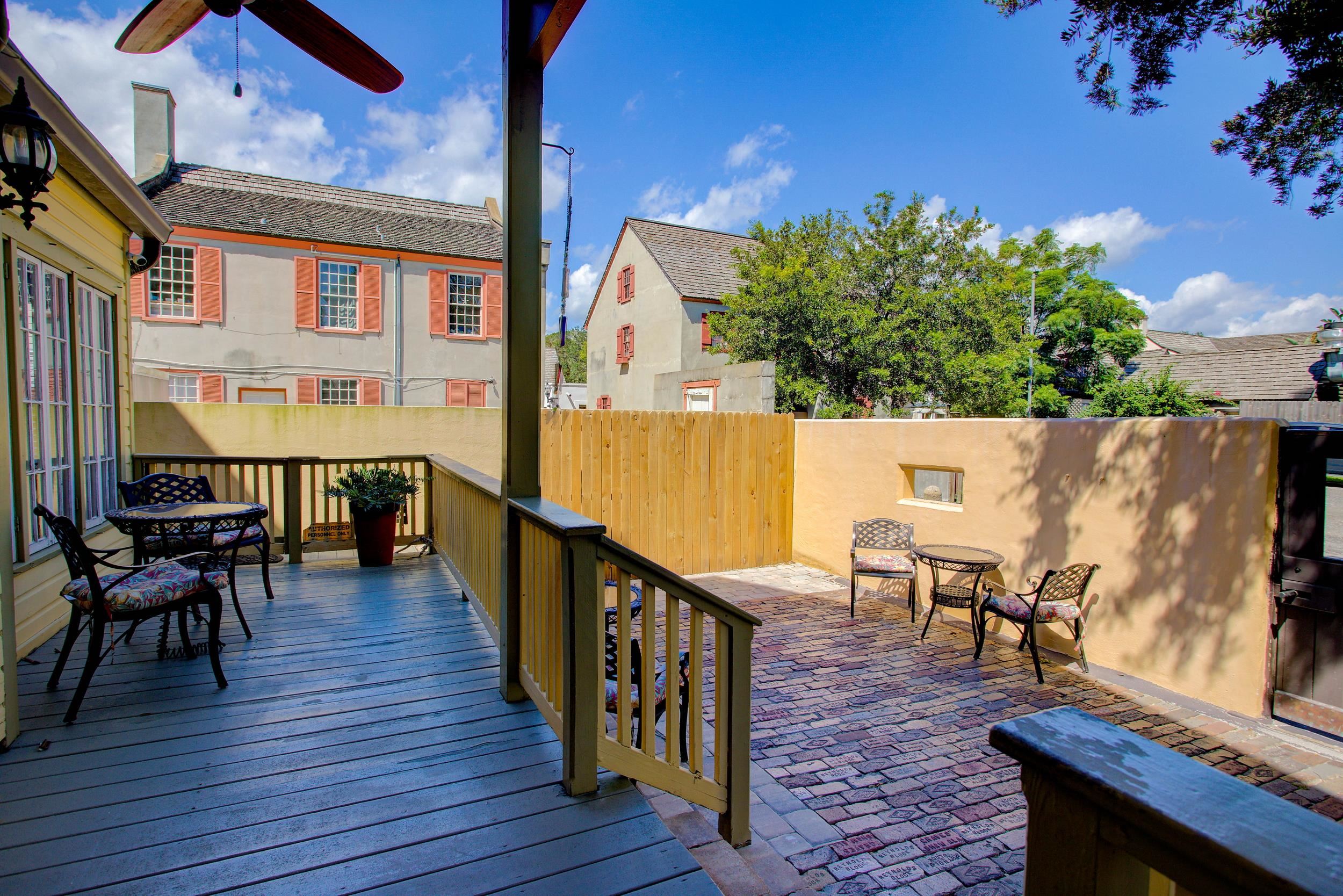 29 Cuna Street St. Augustine, FL 32084 - Photo 11 of 69 Wooden deck featuring a patio, a fenced backyard, and outdoor dining area