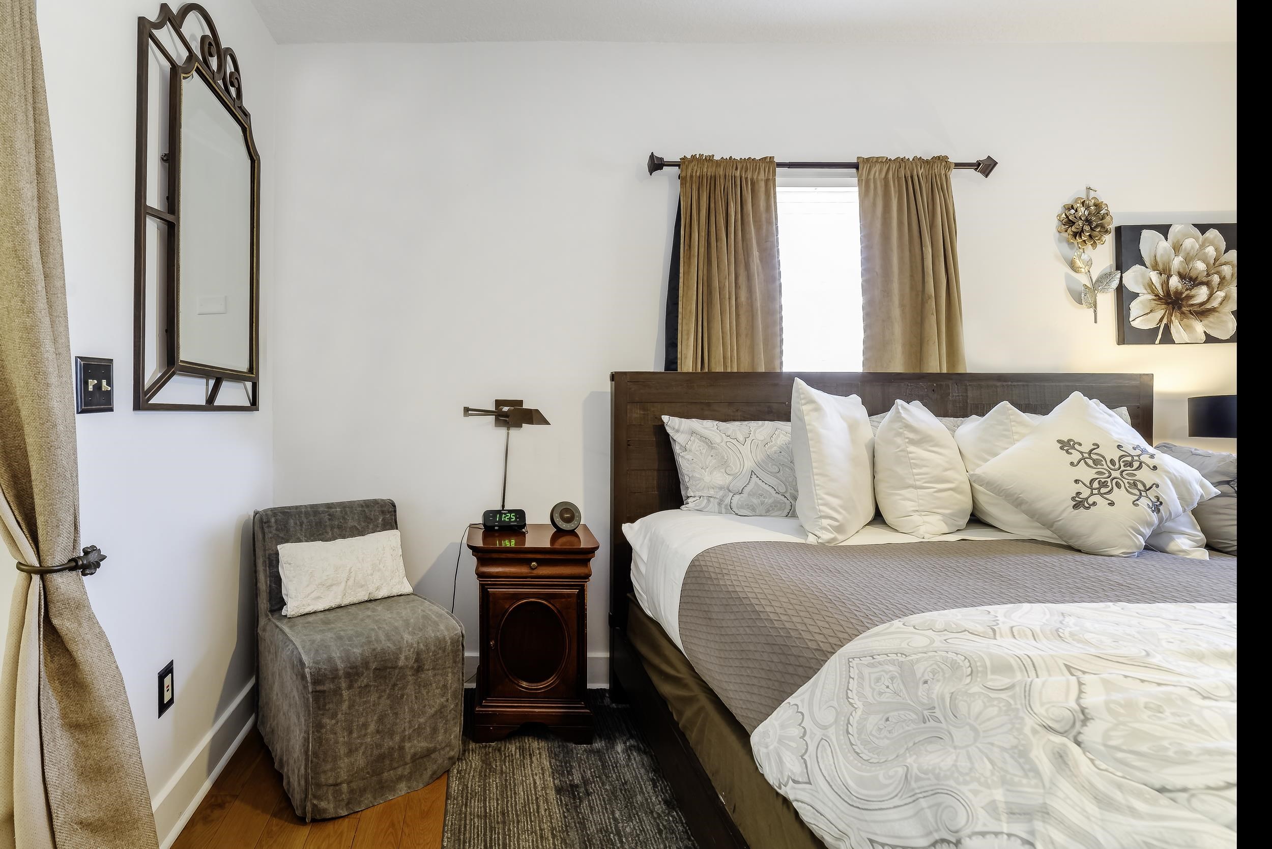 29 Cuna Street St. Augustine, FL 32084 - Photo 29 of 69 a bedroom with a bed a couch and dresser