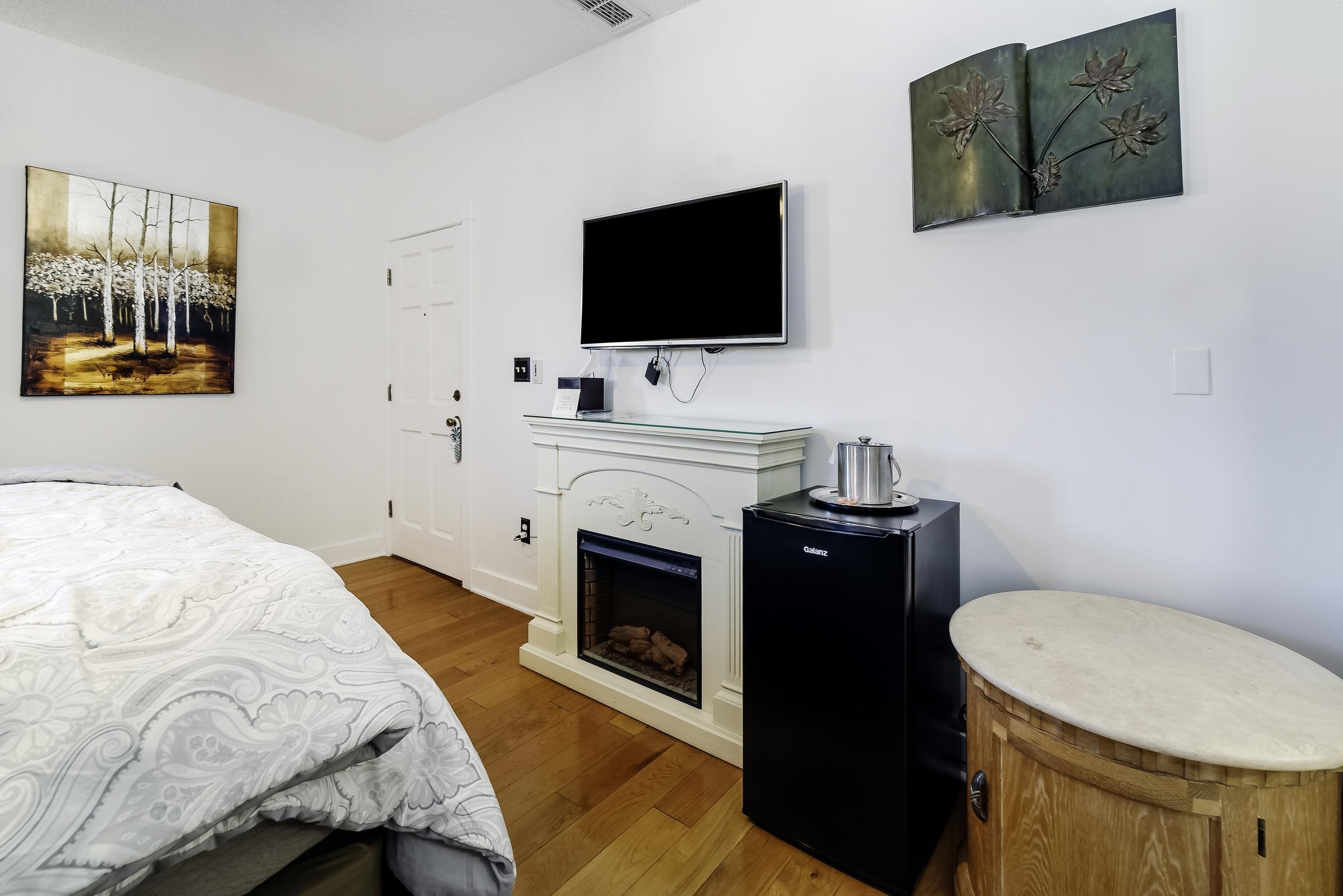 29 Cuna Street St. Augustine, FL 32084 - Photo 32 of 69 a bedroom with a bed and a flat screen tv