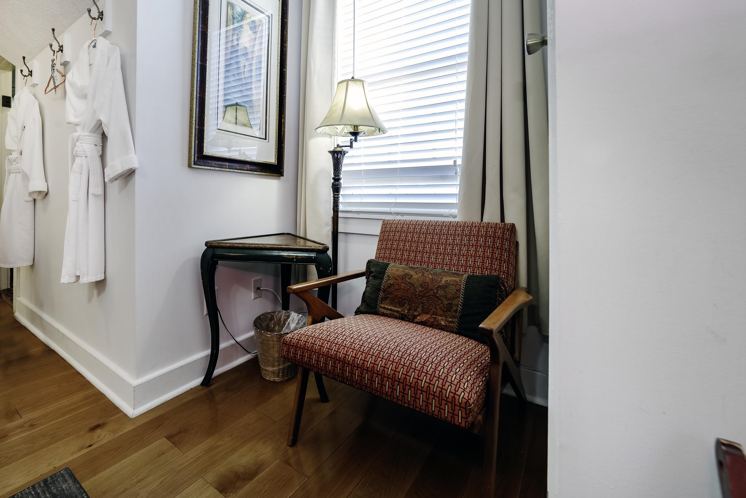 29 Cuna Street St. Augustine, FL 32084 - Photo 34 of 69 Living area featuring baseboards and dark wood finished floors