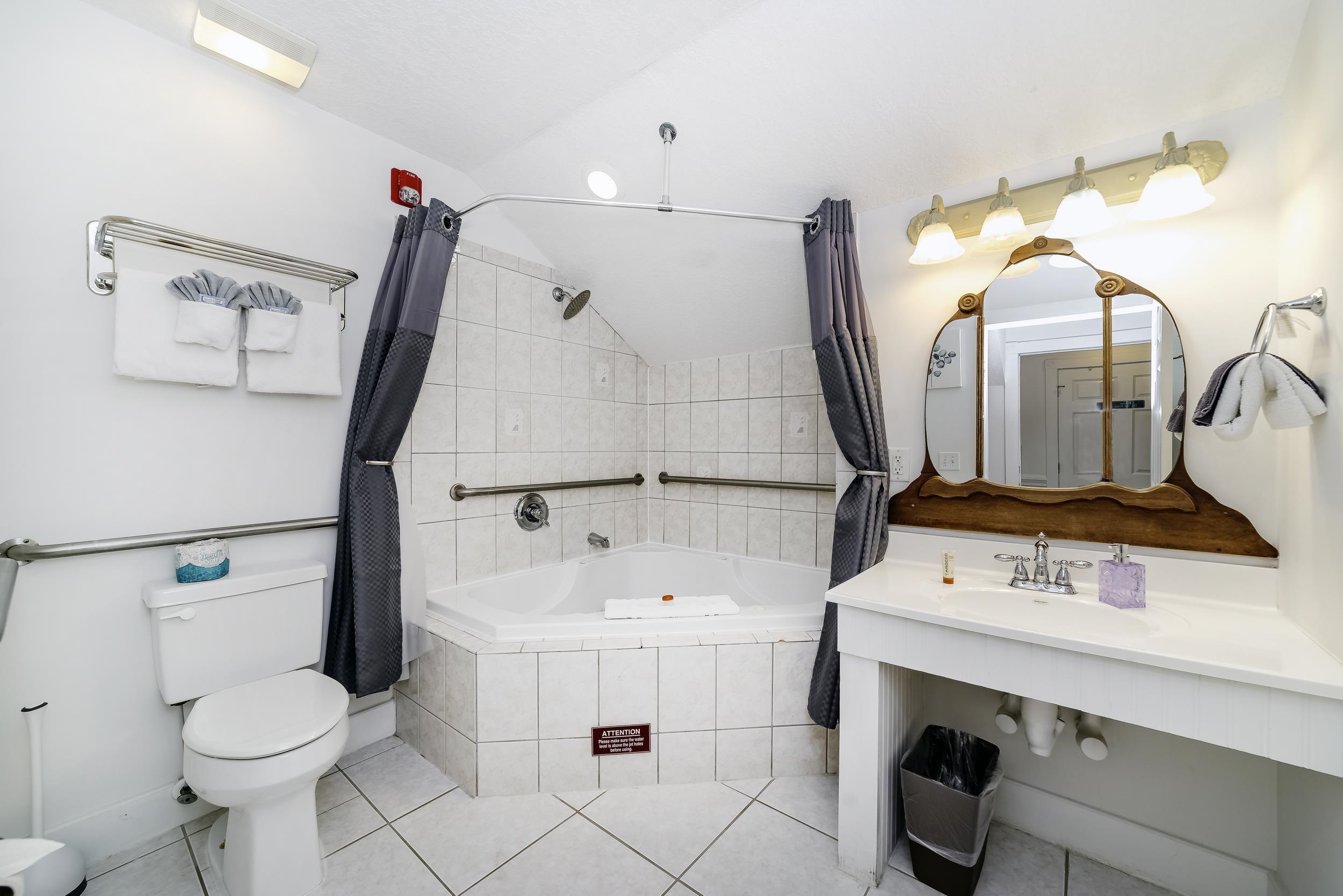 29 Cuna Street St. Augustine, FL 32084 - Photo 35 of 69 a bathroom with a sink vanity mirror and toilet