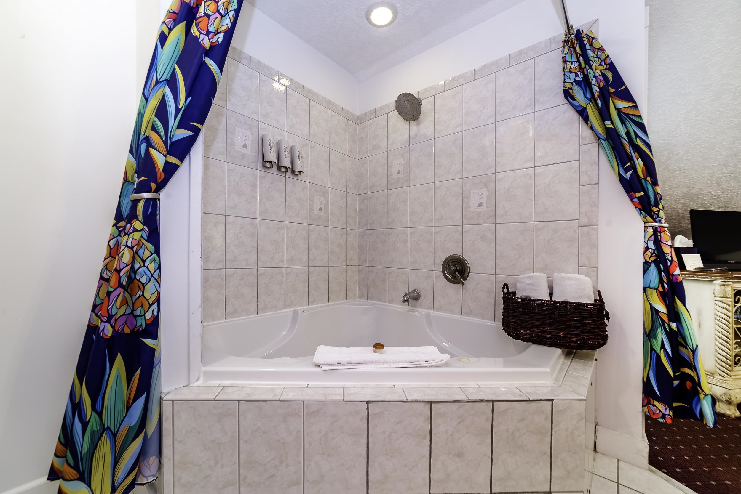 29 Cuna Street St. Augustine, FL 32084 - Photo 39 of 69 a bathroom with a bathtub and a shower