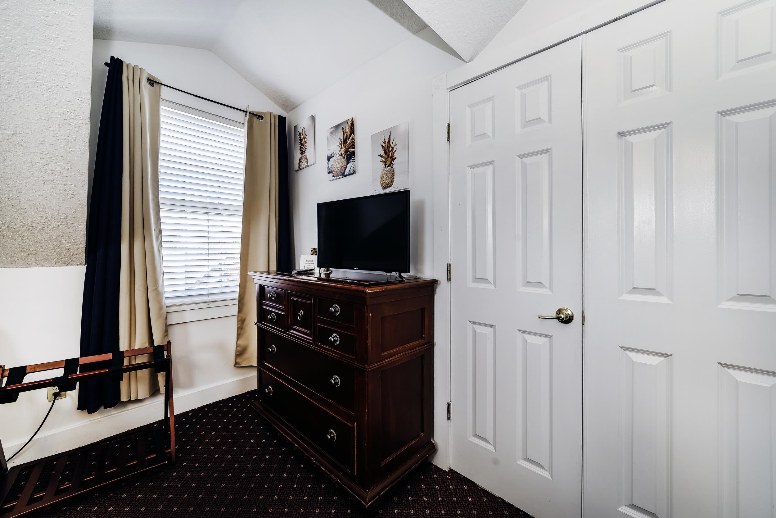 29 Cuna Street St. Augustine, FL 32084 - Photo 44 of 69 a room with furniture and flat screen tv