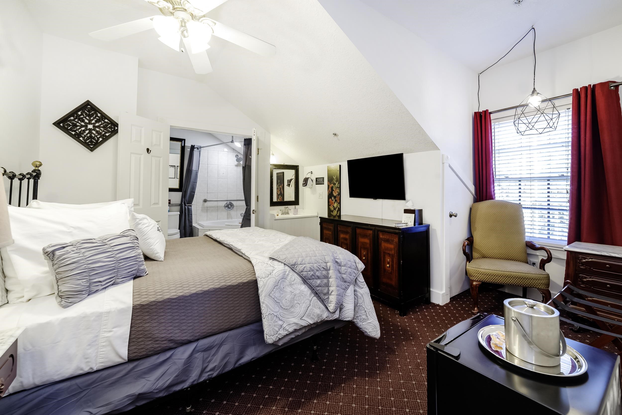 29 Cuna Street St. Augustine, FL 32084 - Photo 46 of 69 a bedroom with a bed and a flat screen tv