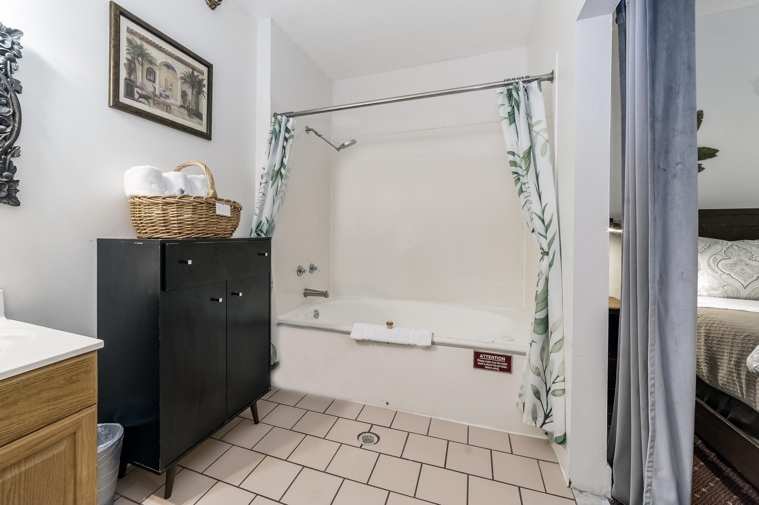 29 Cuna Street St. Augustine, FL 32084 - Photo 52 of 69 a bathroom with a bathtub and a shower