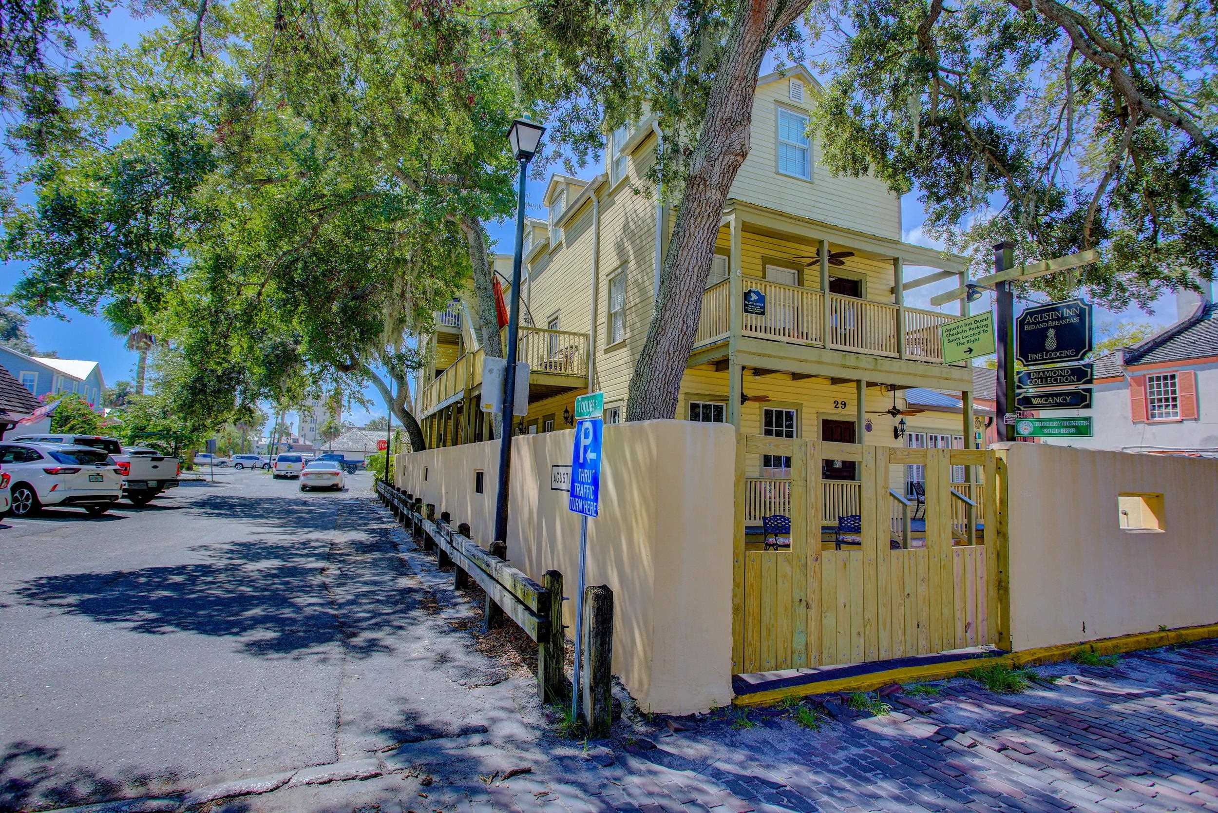 29 Cuna Street St. Augustine, FL 32084 - Photo 57 of 69 View of home's exterior featuring a fenced front yard and a gate