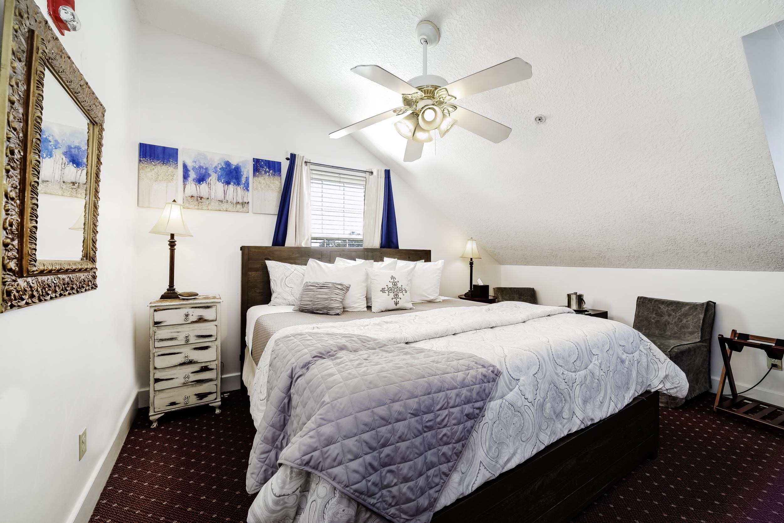 29 Cuna Street St. Augustine, FL 32084 - Photo 61 of 69 Carpeted bedroom featuring lofted ceiling, a textured ceiling, and a ceiling fan