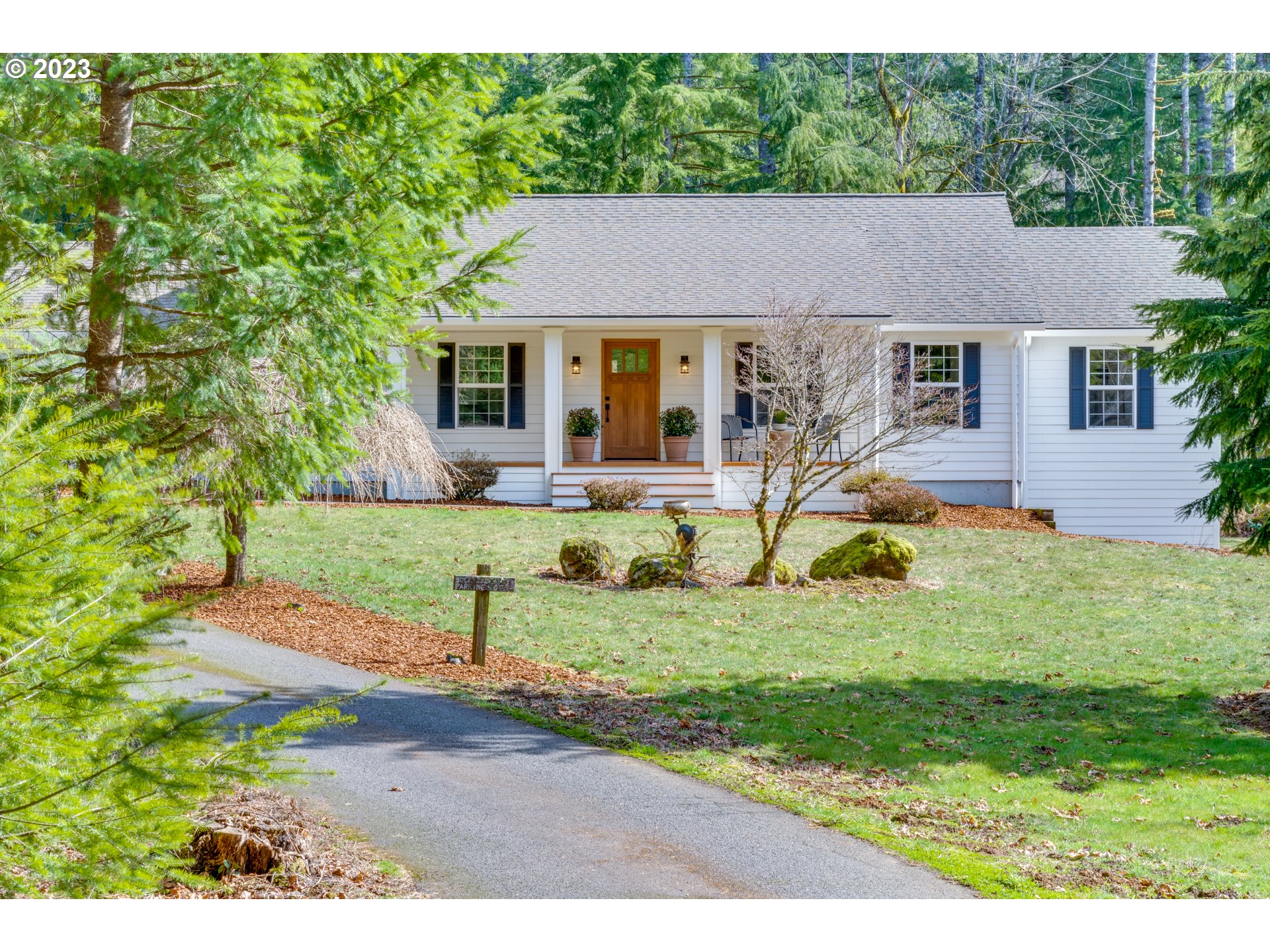 42800 Southeast Louden Road Corbett, OR 97019 - Photo 1 of 32 a view of a house with a yard and sitting area