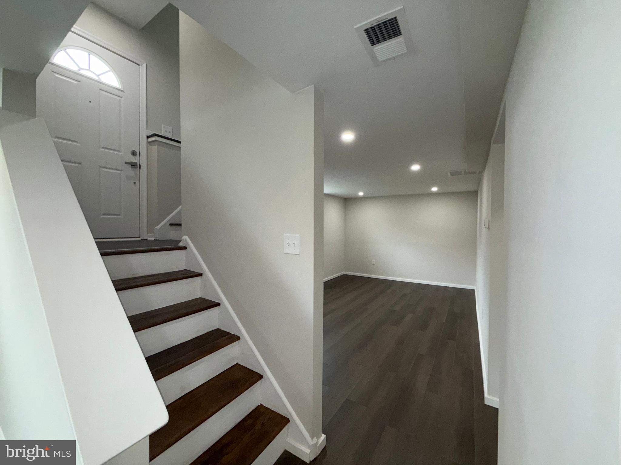 9411 Blackstone Road Manassas, VA 20110 - Photo 24 of 34 Stairs and Family Room