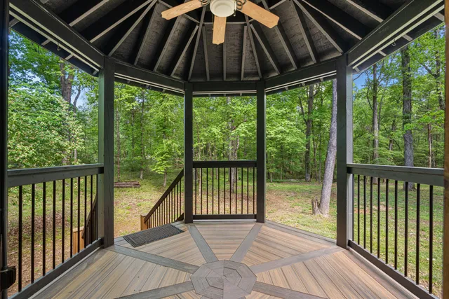 a kitchen with stainless steel appliances granite countertop a stove and a refrigerator