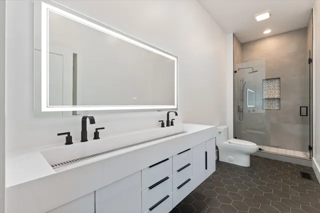 a white bath tub sitting in a bathroom