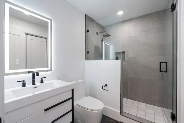 a view of hallway with wooden floor