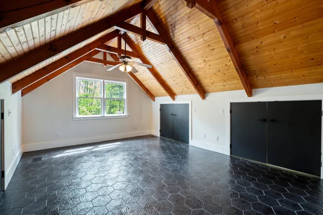 a view of front door and deck of the house